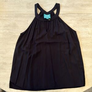 Black Escapada halter top, size M.